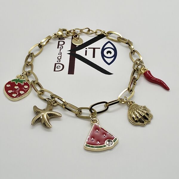 Pulsera de acero dorado con colgantes frutales y marinos